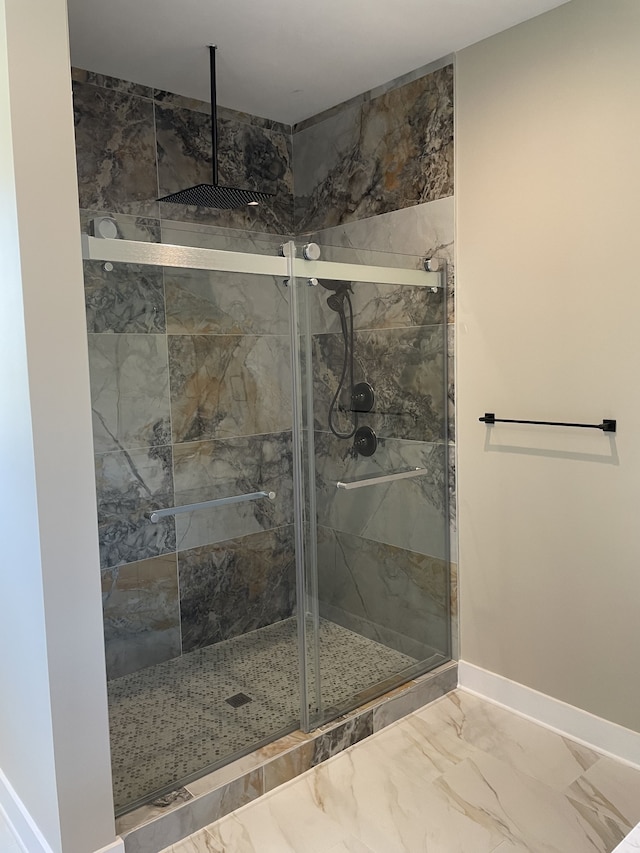 bathroom featuring walk in shower