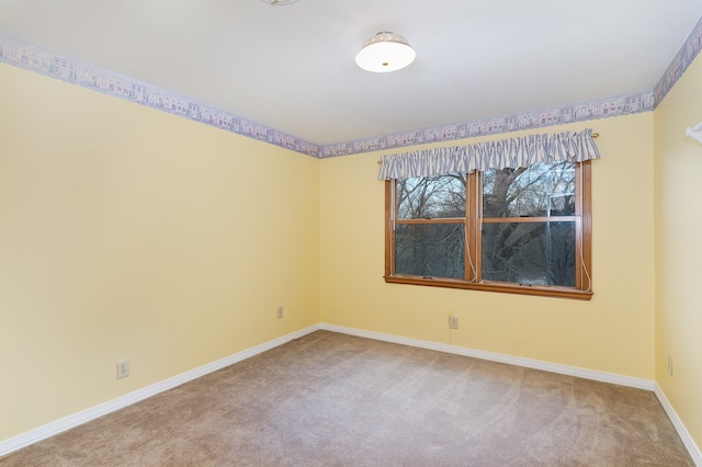 spare room with carpet flooring