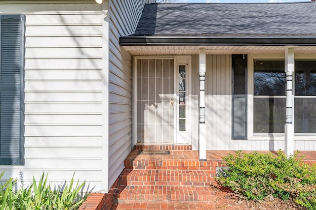 doorway to property with covered porch