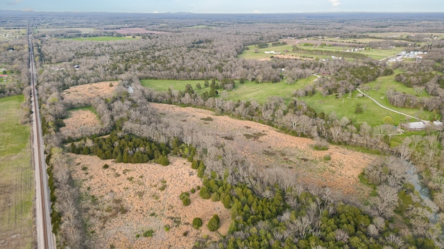 birds eye view of property featuring a rural view