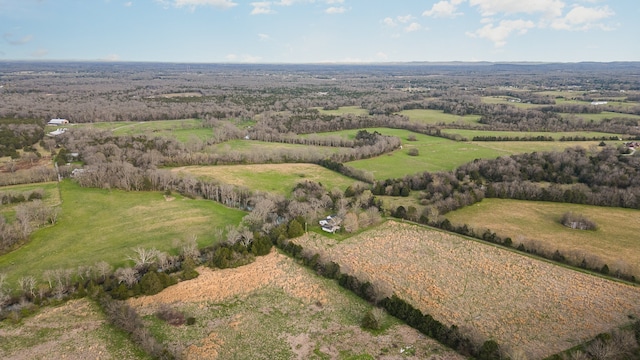 birds eye view of property featuring a rural view