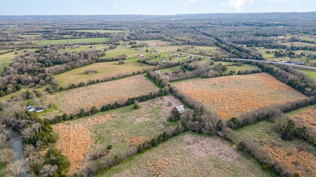 birds eye view of property featuring a rural view