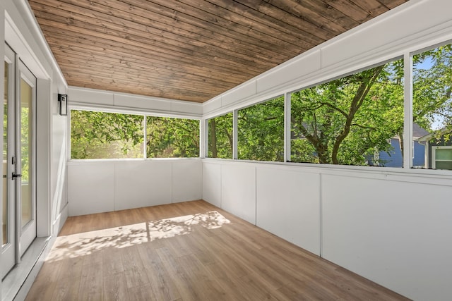 unfurnished sunroom featuring wooden ceiling