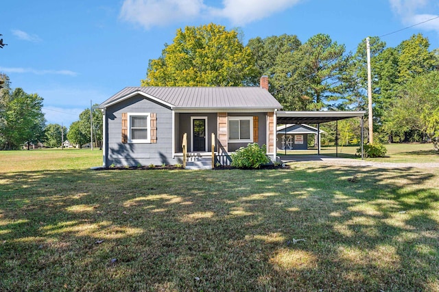 view of front facade with a porch, a carport, and a front yard