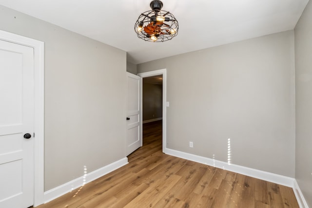 unfurnished bedroom with light hardwood / wood-style flooring