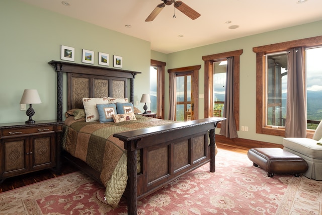 bedroom featuring light hardwood / wood-style floors and ceiling fan