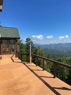 wooden terrace with a mountain view