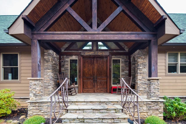 property entrance featuring covered porch