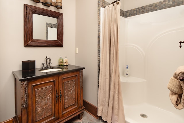 bathroom with vanity, tile patterned floors, and a shower with curtain