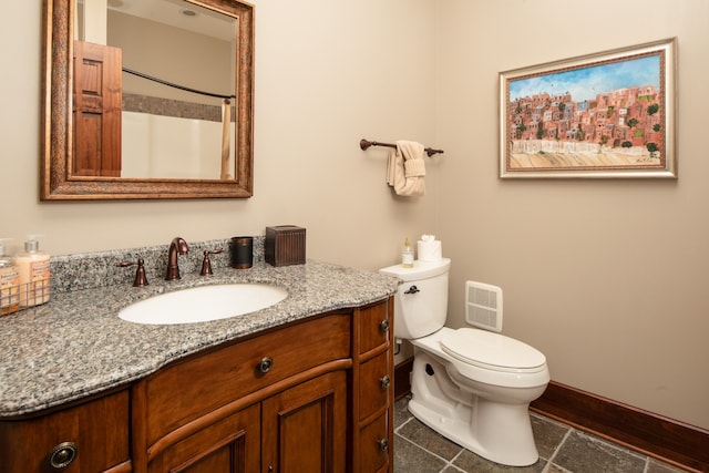 bathroom featuring vanity, toilet, a shower with curtain, and tile patterned flooring