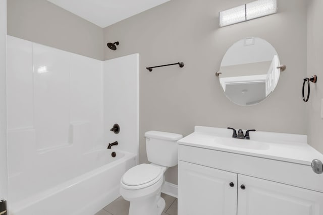 full bathroom featuring vanity, tile patterned flooring, toilet, and shower / washtub combination