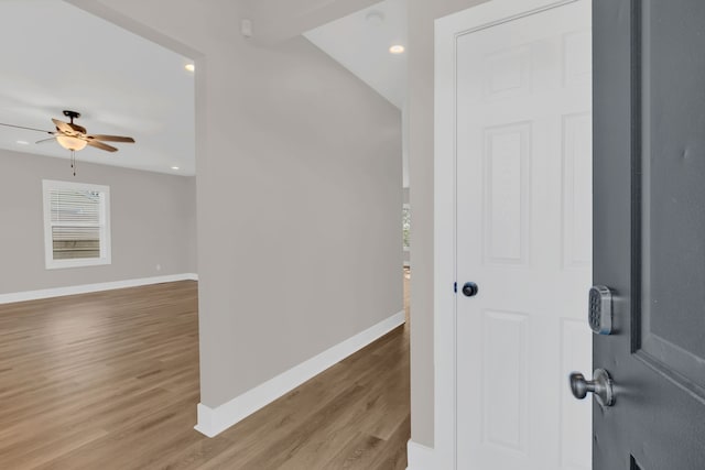 corridor featuring light hardwood / wood-style floors