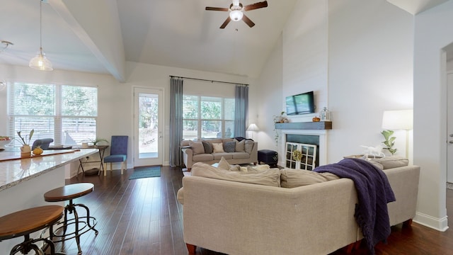 living room with ceiling fan, high vaulted ceiling, and dark hardwood / wood-style flooring