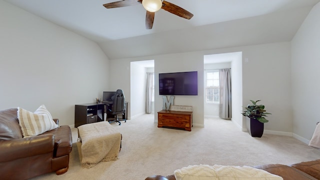 living room with ceiling fan, light carpet, and lofted ceiling