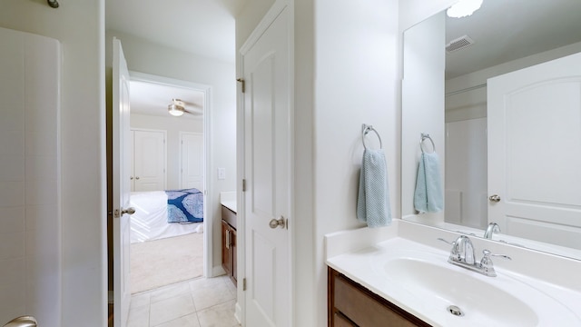 bathroom featuring vanity and tile patterned flooring