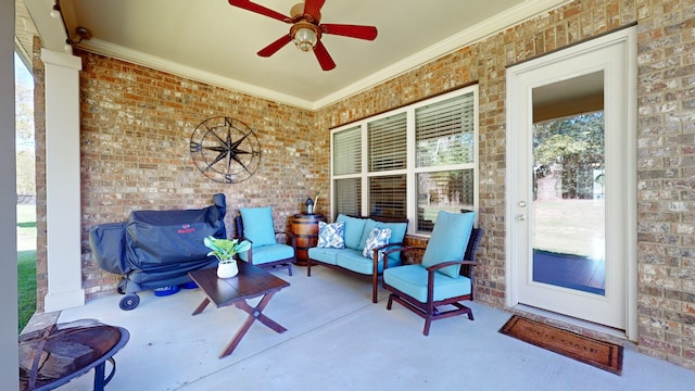 view of patio / terrace featuring ceiling fan