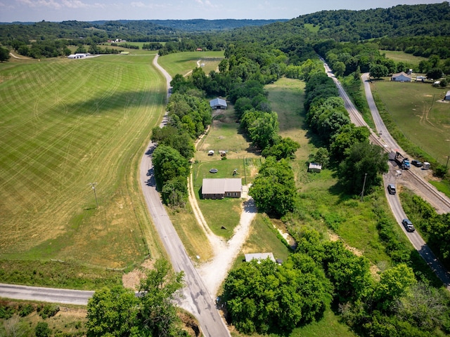 birds eye view of property featuring a rural view