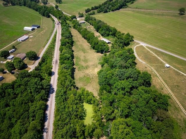 birds eye view of property featuring a rural view