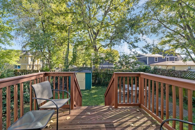 deck featuring a shed