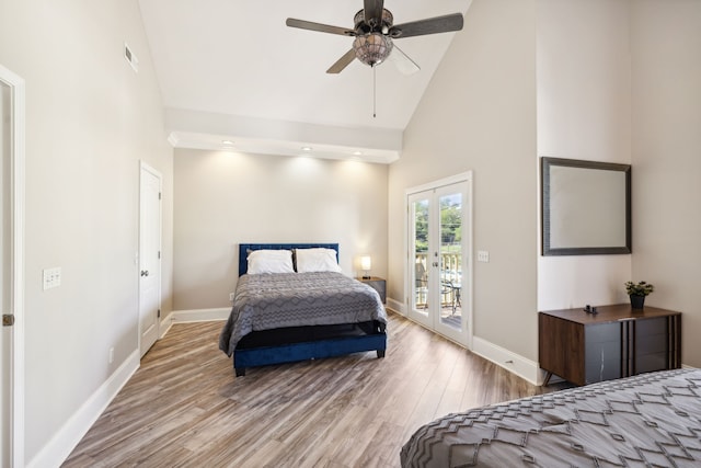 bedroom with access to outside, high vaulted ceiling, french doors, ceiling fan, and light hardwood / wood-style floors