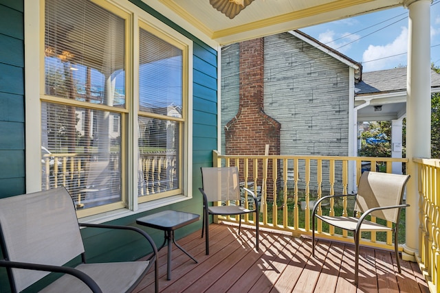 wooden deck with ceiling fan