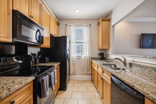 kitchen with black appliances, crown molding, light stone countertops, and sink