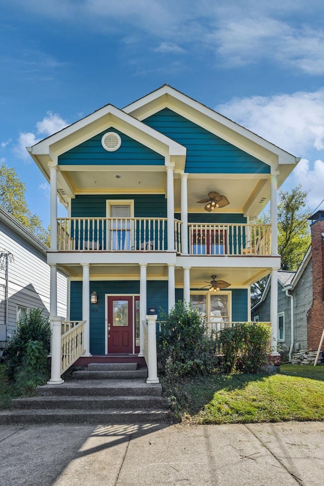 view of front facade with a porch and a balcony