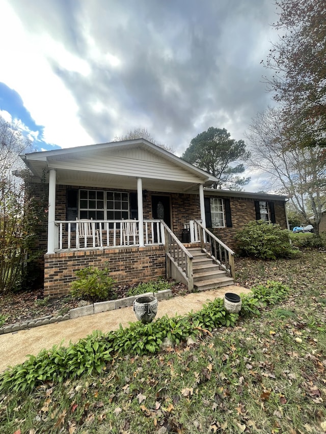 view of front facade featuring covered porch