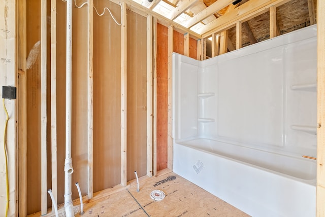 bathroom with a washtub