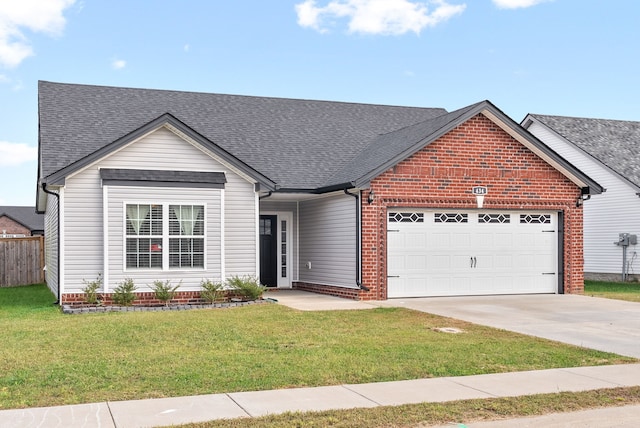 ranch-style home with a garage and a front yard