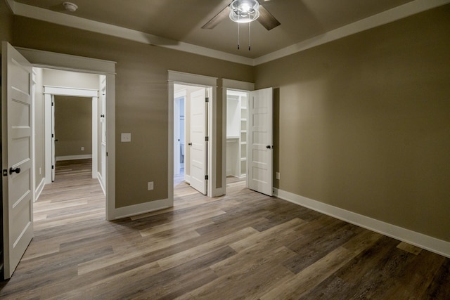 unfurnished bedroom with light hardwood / wood-style floors and ceiling fan