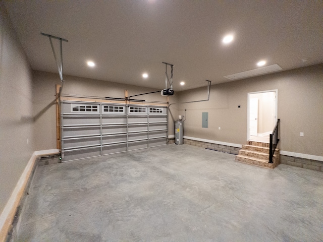 garage with electric water heater, a garage door opener, and electric panel