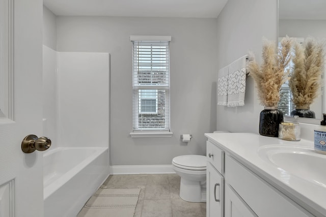 full bathroom featuring tile patterned flooring, vanity, toilet, and washtub / shower combination