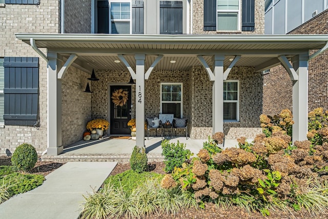 entrance to property with covered porch