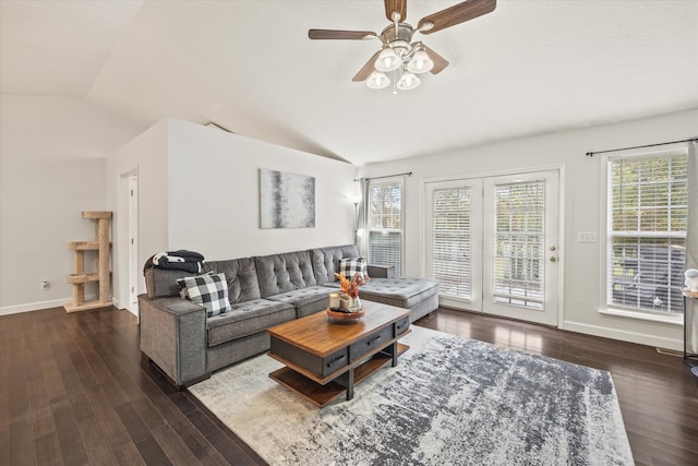 living room with lofted ceiling, ceiling fan, and dark hardwood / wood-style flooring