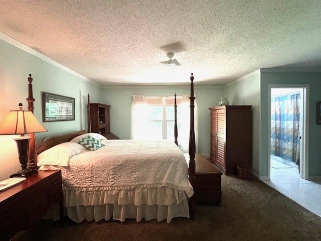 carpeted bedroom with ornamental molding, access to exterior, and a textured ceiling