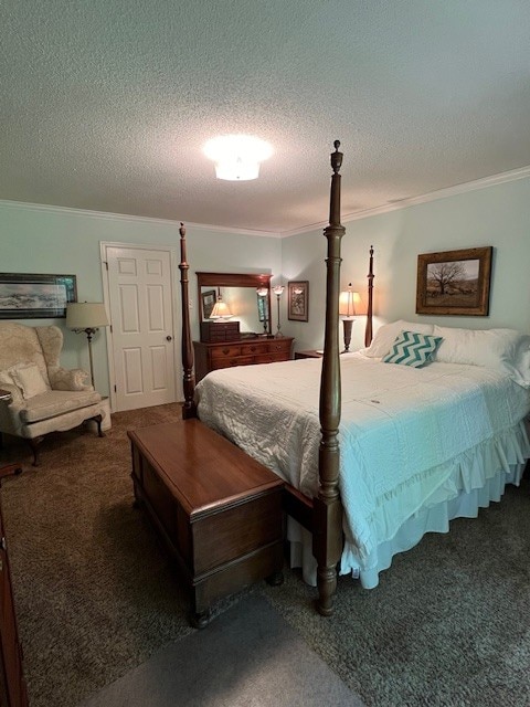 carpeted bedroom with ornamental molding and a textured ceiling