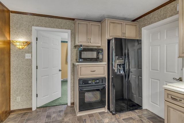 kitchen featuring light brown cabinetry, crown molding, and black appliances