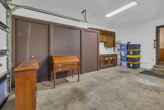 garage featuring electric water heater