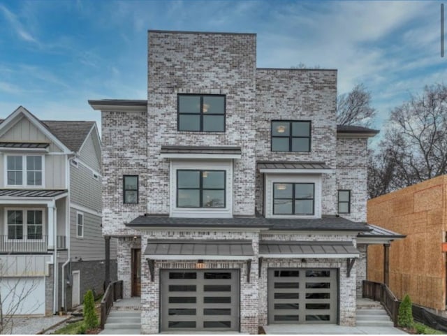 contemporary home with a garage