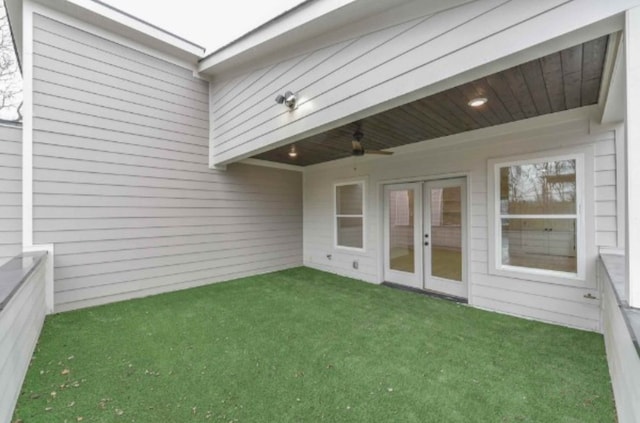 exterior space with french doors and ceiling fan