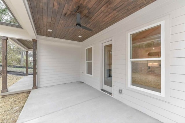 view of patio featuring ceiling fan