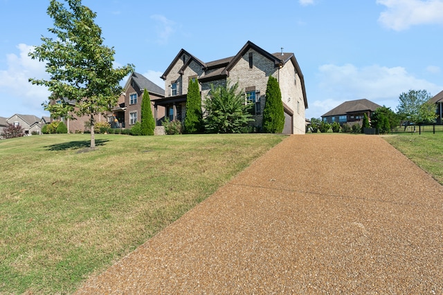 view of front of house featuring a front lawn