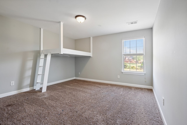 spare room with carpet flooring