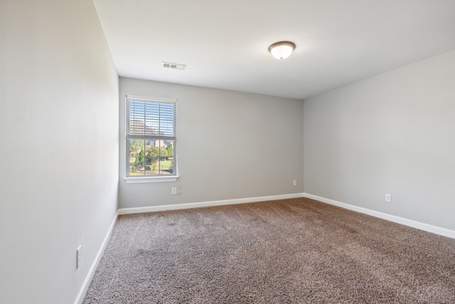 empty room featuring carpet flooring