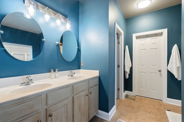 bathroom featuring tile patterned floors and vanity