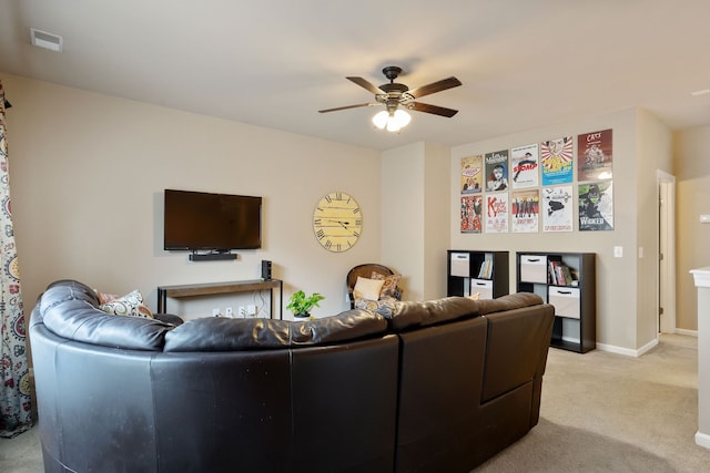 living room with ceiling fan and light carpet