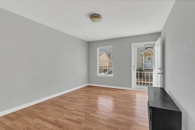 spare room with light wood-type flooring