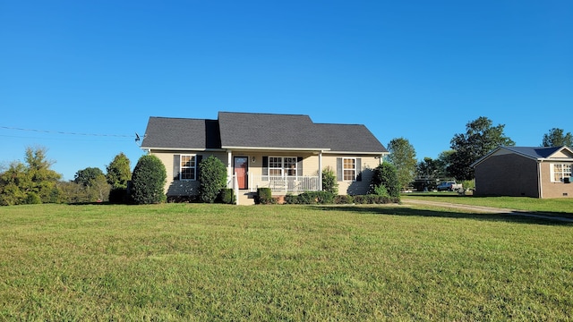 view of front of house with a front lawn and covered porch