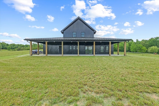 back of house with a yard